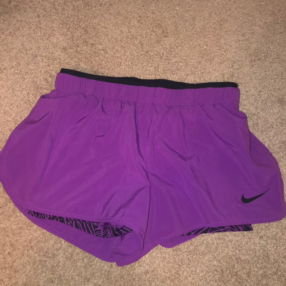 Purple Nike shorts